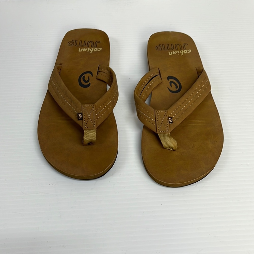 Men’s cobian jump flip flops.  New but no tags